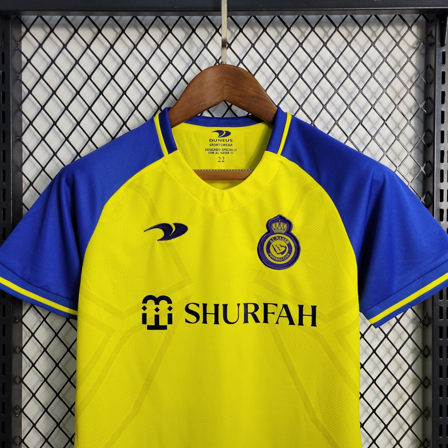 Kit niños-Al-Nassr FC Principal 22/23